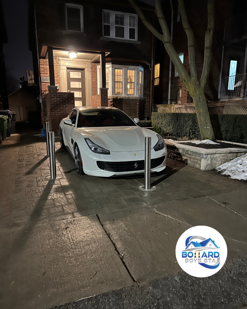 Driveway Bollards protecting vehicle